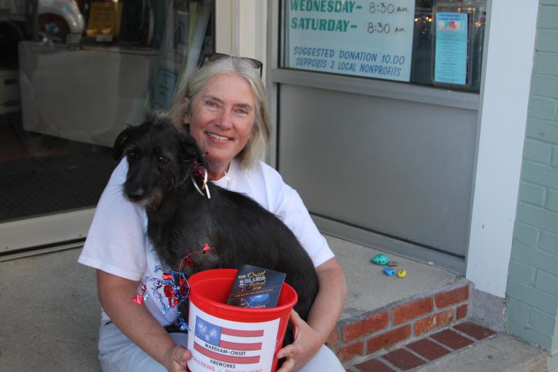 Rebecca Stanford of Wareham and her dog Lucy collect donations for the Onset Bay Association. BY MEGHAN NEELY